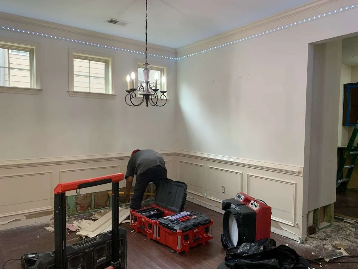 Restoration technician with professional equipment in Wesley Chapel
